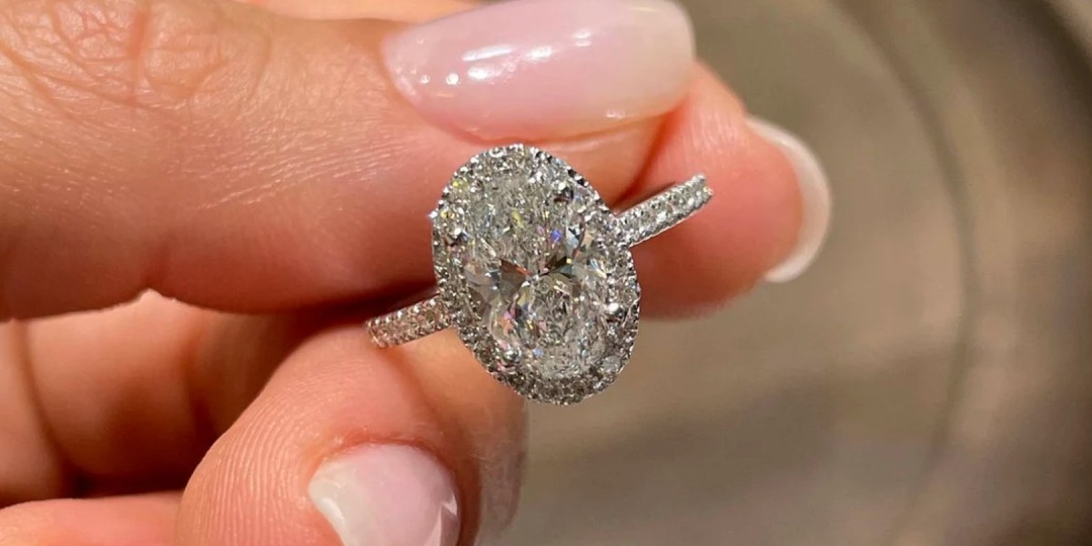 gold band oval cut engagement ring